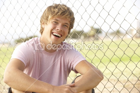dep_4823339-Teenage-Boy-Sitting-In-Playground.jpeg