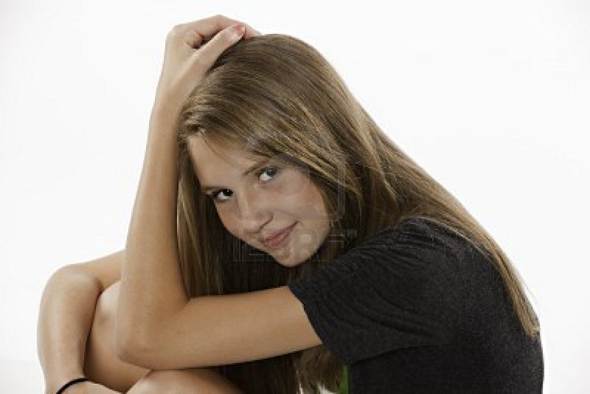 10034135-a-pretty-long-brown-hair-teenage-female-girl-sitting-isolated-on-a-white-background.jpg
